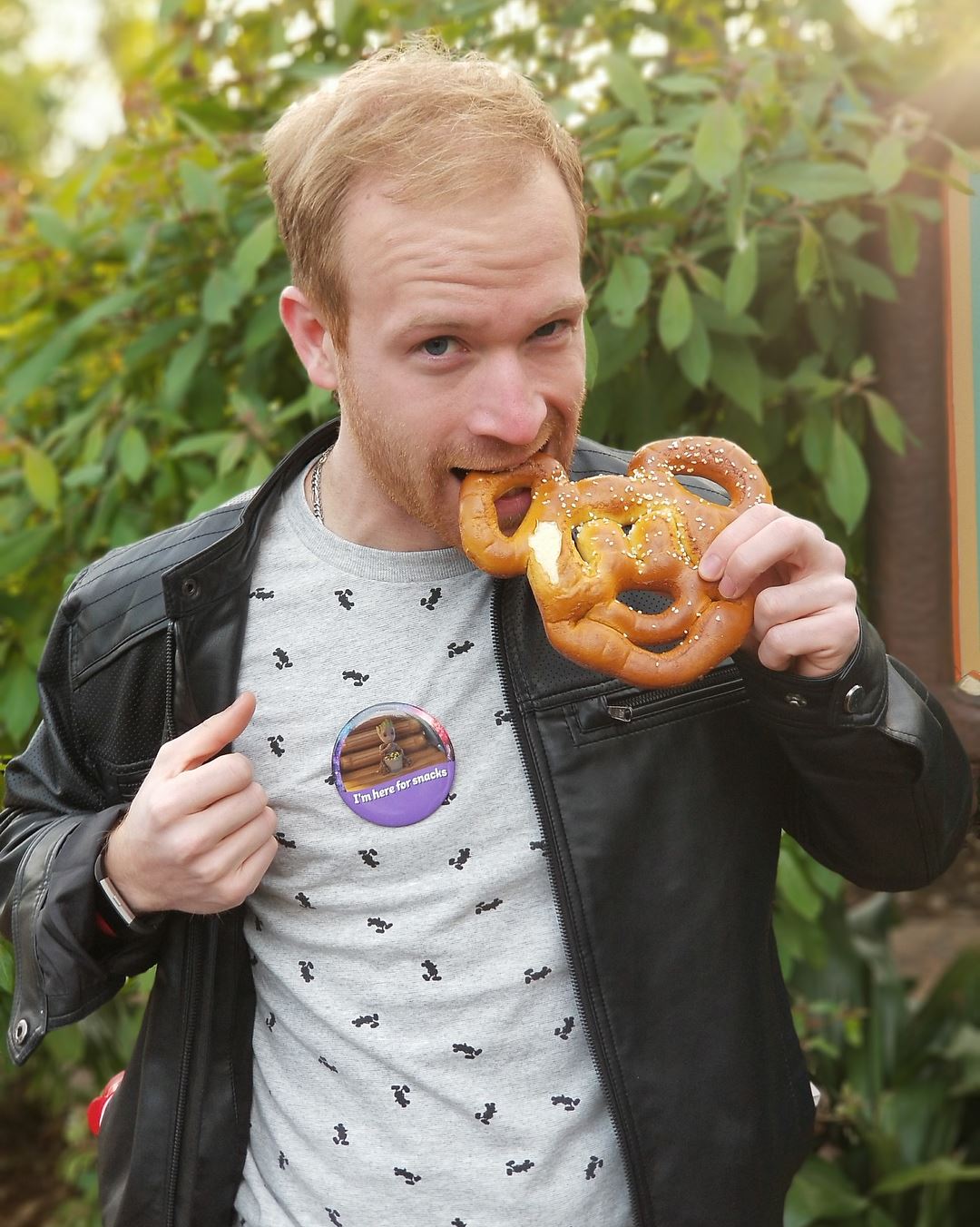 Picture of me eating a pretzel at Disney